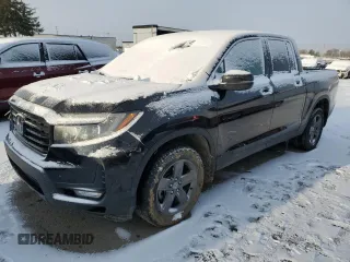 2022 Honda Ridgeline RTL-E with VIN 5FPYK3F71NB013472, listed as a Copart auction lot 45814155 with 58,748 mi miles and Salvage Title. Bid and sale history available at DreamBid. Image 1.