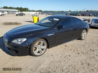 2014 BMW 6 Series 650i xDrive with VIN WBA6B4C55ED099057, listed as a Copart auction lot 71337764 with 30,246 mi miles and Salvage Title. Bid and sale history available at carsss.com. Image 1.