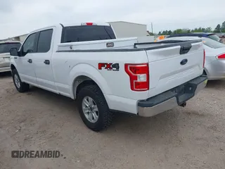 2018 Ford F-150 XL with VIN 1FTFW1E58JKE22834, listed as a IAAI auction lot 41923960 with 214,459 mi miles. Bid and sale history available at carsss.com. Image 3.