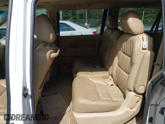 2010 Honda Odyssey EX-L with VIN 5FNRL3H67AB003148, listed as a IAAI auction lot 42244575 with 176,119 mi miles and . Bid and sale history available at DreamBid. Image 8.