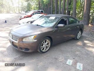 2012 Nissan Maxima S with VIN 1N4AA5AP1CC809218, listed as a IAAI auction lot 42577951 with 98,508 mi miles and . Bid and sale history available at DreamBid. Image 2.