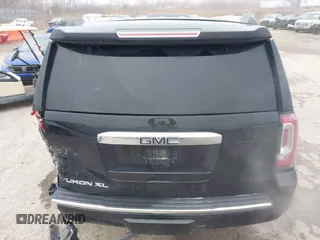 2017 GMC Yukon XL Denali with VIN 1GKS2HKJ2HR310377, listed as a IAAI auction lot 41153582 with 130,194 mi miles. Bid and sale history available at carsss.com. Image 19.