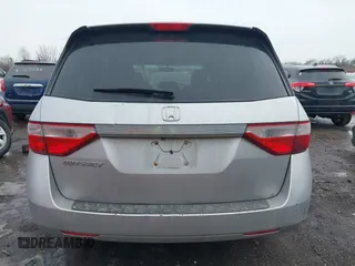 2013 Honda Odyssey EX-L with VIN 5FNRL5H63DB007682, listed as a IAAI auction lot 41408103 with 201,453 mi miles and . Bid and sale history available at carsss.com. Image 16.