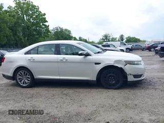 2014 Ford Taurus Limited with VIN 1FAHP2F82EG121267, listed as a IAAI auction lot 42377620 with 123,199 mi miles and . Bid and sale history available at DreamBid. Image 14.