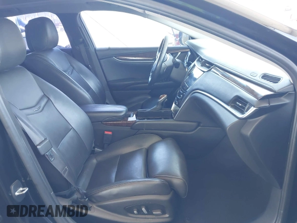2013 Cadillac XTS Luxury with VIN 2G61P5S35D9105460, listed as a IAAI auction lot 42582313 with 144,895 mi miles and . Bid and sale history available at DreamBid. Image 5.