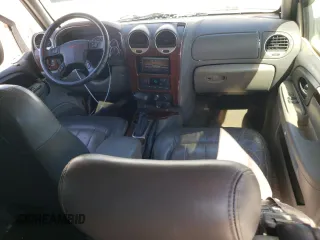 2003 GMC Envoy SLT z VIN 1GKET16SX36234308, wystawiony jako Copart lot #45653505 z przebiegiem 184 324 mil mil oraz Szkoda całkowita • Salvage title. Historia ofert i sprzedaży dostępna na DreamBid. Obrazek 8.