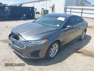2020 Ford Fusion SE z VIN 3FA6P0H79LR118534, wystawiony jako IAAI lot #42065215 z przebiegiem 104 202 mil mil oraz . Historia ofert i sprzedaży dostępna na DreamBid. Obrazek 2.