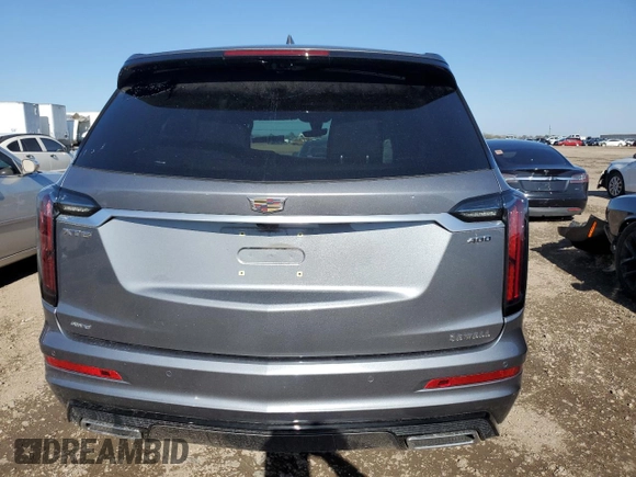 2022 Cadillac XT6 Sport with VIN 1GYKPGRS3NZ142843, listed as a Copart auction lot 47843925 with 26,668 mi miles and Salvage Title. Bid and sale history available at carsss.com. Image 6.