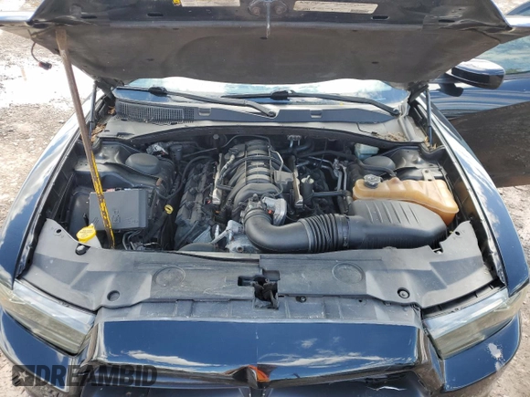 2012 Dodge Charger Police z VIN 2C3CDXAT1CH181827, wystawiony jako Copart lot #58161125 z przebiegiem 117 203 mil mil oraz Szkoda całkowita • Salvage title. Historia ofert i sprzedaży dostępna na DreamBid. Obrazek 11.