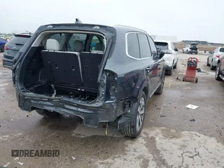 2022 Kia Telluride EX with VIN 5XYP34HC0NG195434, listed as a IAAI auction lot 42171838 with 52,506 mi miles and . Bid and sale history available at DreamBid. Image 4.