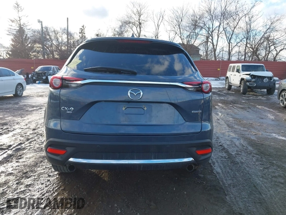 2022 Mazda CX-9 Grand Touring with VIN JM3TCBDYXN0618313, listed as a IAAI auction lot 41452750 with 34,356 mi miles and . Bid and sale history available at DreamBid. Image 16.
