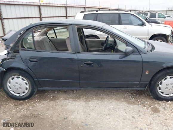2002 Saturn SL with VIN 1G8ZH52852Z270057, listed as a IAAI auction lot 41816011 with 314,884 mi miles. Bid and sale history available at carsss.com. Image 13.