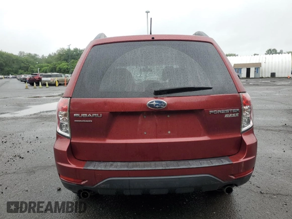 2012 Subaru Forester X Premium с VIN JF2SHADC7CH453583, выставлен на аукционе Copart как лот 61231275 с пробегом 125 312 миль миль и Списание • Salvage title. История ставок и продаж доступна на DreamBid. Изображение 6.