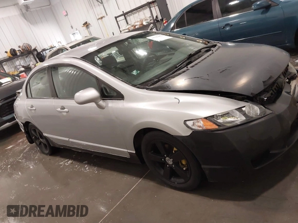 2009 Honda Civic LX z VIN 2HGFA16559H320179, wystawiony jako IAAI lot #41793459 z przebiegiem 172 878 mil mil oraz . Historia ofert i sprzedaży dostępna na DreamBid. Obrazek 13.