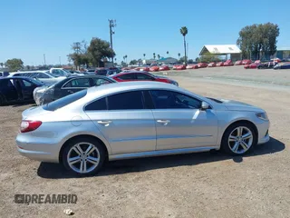 2010 Volkswagen CC Sport with VIN WVWMP7ANXAE558605, listed as a IAAI auction lot 41855410 with 175,307 mi miles and . Bid and sale history available at DreamBid. Image 13.
