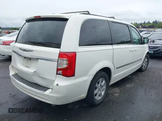2013 Chrysler Town & Country Touring with VIN 2C4RC1BG7DR629829, listed as a IAAI auction lot 42152230 with 188,473 mi miles. Bid and sale history available at carsss.com. Image 4.