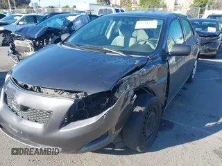 2009 Toyota Corolla with VIN 1NXBU40E09Z147694, listed as a IAAI auction lot 41741275 with 170,912 mi miles. Bid and sale history available at carsss.com. Image 6.