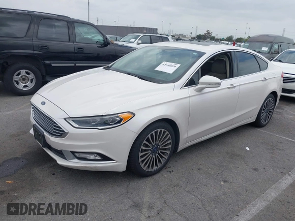 2017 Ford Fusion SE with VIN 3FA6P0HD0HR180188, listed as a IAAI auction lot 42146020 with 100,901 mi miles and . Bid and sale history available at DreamBid. Image 17.