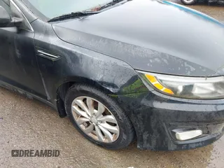 2015 Kia Optima EX with VIN 5XXGN4A71FG391444, listed as a IAAI auction lot 41991844 with 126,197 mi miles. Bid and sale history available at carsss.com. Image 6.