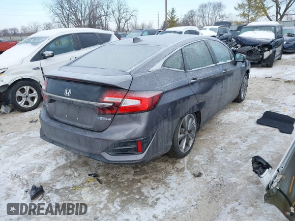2018 Honda Clarity z VIN JHMZC5F13JC006627, wystawiony jako IAAI lot #41335364 z przebiegiem 58 662 mil mil oraz . Historia ofert i sprzedaży dostępna na DreamBid. Obrazek 4.
