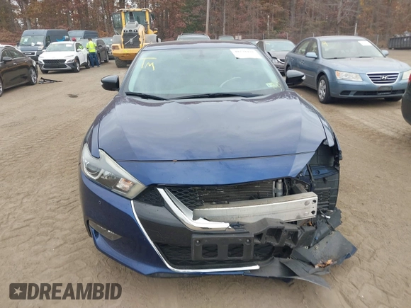 2016 Nissan Maxima Platinum z VIN 1N4AA6AP4GC414364, wystawiony jako IAAI lot #40738491 z przebiegiem 97 889 mil mil oraz . Historia ofert i sprzedaży dostępna na DreamBid. Obrazek 12.