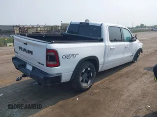 2022 Ram 1500 Rebel with VIN 1C6SRFLT5NN318494, listed as a IAAI auction lot 42413194 with 59,458 mi miles and . Bid and sale history available at DreamBid. Image 4.