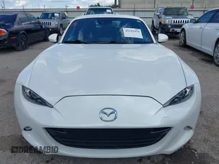 2020 Mazda MX-5 Miata Grand Touring z VIN JM1NDAM79L0411456, wystawiony jako IAAI lot #42229479 z przebiegiem 63 508 mil mil oraz . Historia ofert i sprzedaży dostępna na DreamBid. Obrazek 12.