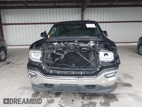 2017 GMC Sierra 1500 SLE z VIN 1GTV2MEC2HZ324763, wystawiony jako IAAI lot #42234082 z przebiegiem 106 984 mil mil oraz . Historia ofert i sprzedaży dostępna na DreamBid. Obrazek 12.