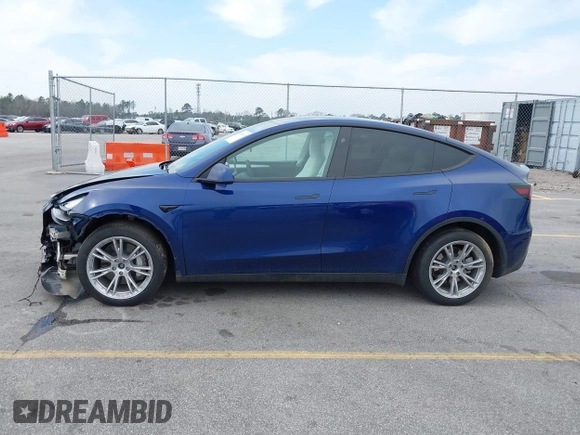 2023 Tesla Model Y Long Range with VIN 7SAYGDEE7PA194998, listed as a IAAI auction lot 41787170 with 16,221 mi miles and . Bid and sale history available at DreamBid. Image 14.