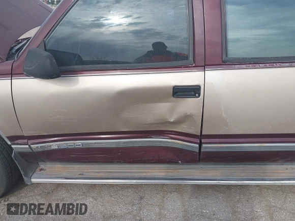 1993 GMC Suburban with VIN 1GKEC16KXPJ734150, listed as a IAAI auction lot 42114021 with 254,501 mi miles and . Bid and sale history available at DreamBid. Image 6.