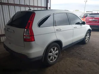 2009 Honda CR-V EX-L with VIN JHLRE387X9C003580, listed as a IAAI auction lot 41945794 with 131,061 mi miles. Bid and sale history available at carsss.com. Image 4.