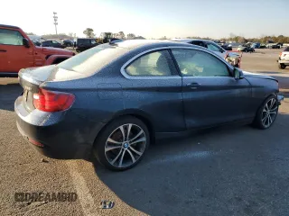 2015 BMW 2 Series 228i xDrive with VIN WBA1F7C50FVX95823, listed as a Copart auction lot 87157134 with 55,312 mi miles and Salvage Title. Bid and sale history available at carsss.com. Image 3.