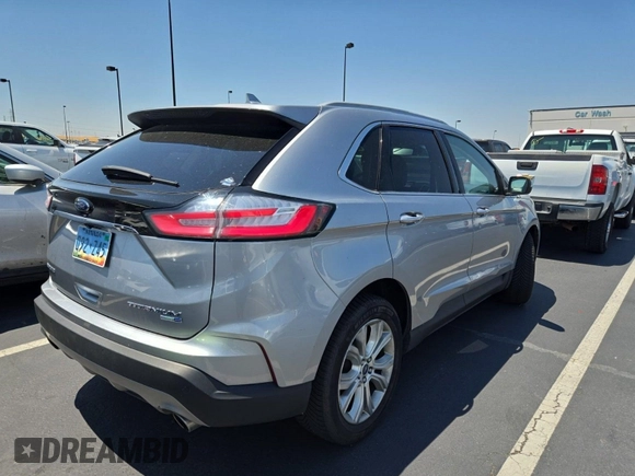 2020 Ford Edge Titanium with VIN 2FMPK4K92LBA30658, listed as a IAAI auction lot 42848998 with 63,460 mi miles and . Bid and sale history available at DreamBid. Image 58.