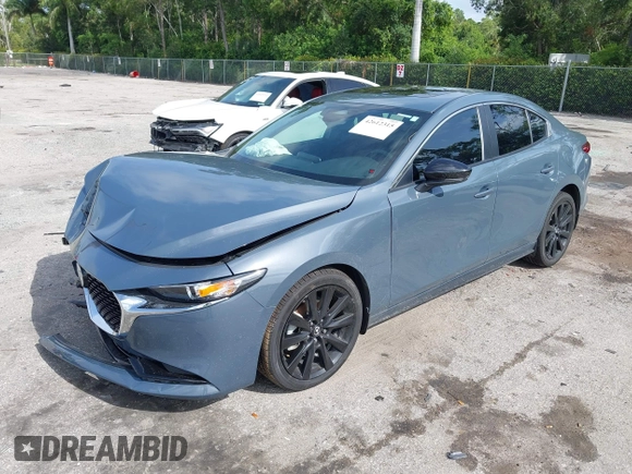 2024 Mazda 3 S Carbon Edition with VIN 3MZBPBCM2RM403824, listed as a IAAI auction lot 42612315 with 8,261 mi miles and . Bid and sale history available at DreamBid. Image 18.