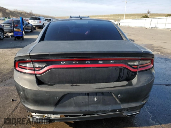 2015 Dodge Charger SE with VIN 2C3CDXBG2FH795792, listed as a Copart auction lot 51297775 with 115,690 mi miles and Salvage Title. Bid and sale history available at DreamBid. Image 6.
