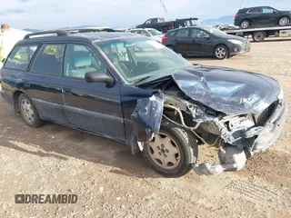 1998 Subaru Legacy L z VIN 4S3BK4353W7316977, wystawiony jako IAAI lot #40825105 z przebiegiem 219 906 mil mil oraz . Historia ofert i sprzedaży dostępna na DreamBid. Obrazek 1.
