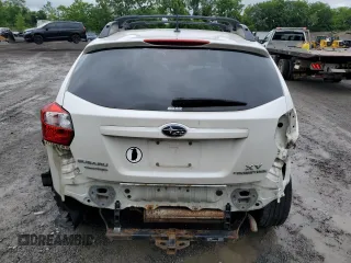 2014 Subaru Crosstrek Premium с VIN JF2GPACC3EG241797, выставлен на аукционе Copart как лот 60115635 с пробегом 143 327 миль миль и Списание • Salvage title. История ставок и продаж доступна на DreamBid. Изображение 6.