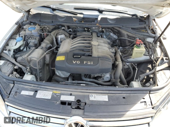 2016 Volkswagen Touareg Sport with VIN WVGEF9BPXGD010830, listed as a Copart auction lot 58663734 with 148,091 mi miles and Salvage Title. Bid and sale history available at DreamBid. Image 11.