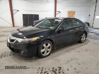 2010 Acura TSX z VIN JH4CU2E62AC004334, wystawiony jako Copart lot #50969665 z przebiegiem 87 287 mil mil oraz Czysty tytuł • Clean title. Historia ofert i sprzedaży dostępna na DreamBid. Obrazek 1.