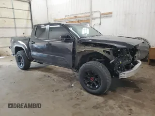 2024 Toyota Tacoma SR5 z VIN 3TMLB5JN6RM060647, wystawiony jako Copart lot #53515055 z przebiegiem 7 240 mil mil oraz Szkoda całkowita • Salvage title. Historia ofert i sprzedaży dostępna na DreamBid. Obrazek 4.