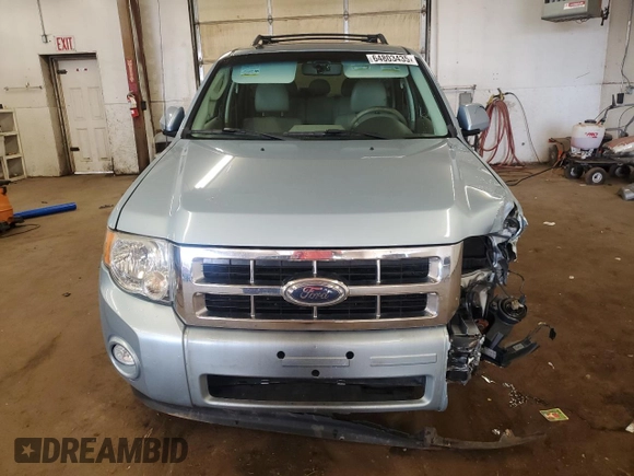 2009 Ford Escape Hybrid with VIN 1FMCU49399KA29841, listed as a Copart auction lot 64803435 with 131,289 mi miles and Salvage title. Bid and sale history available at DreamBid. Image 5.