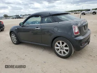 2014 MINI Coupe S z VIN WMWSX3C59ET409209, wystawiony jako Copart lot #78886564 z przebiegiem 118 632 mil mil oraz Tytuł czysty. Historia ofert i sprzedaży dostępna na DreamBid. Obrazek 2.