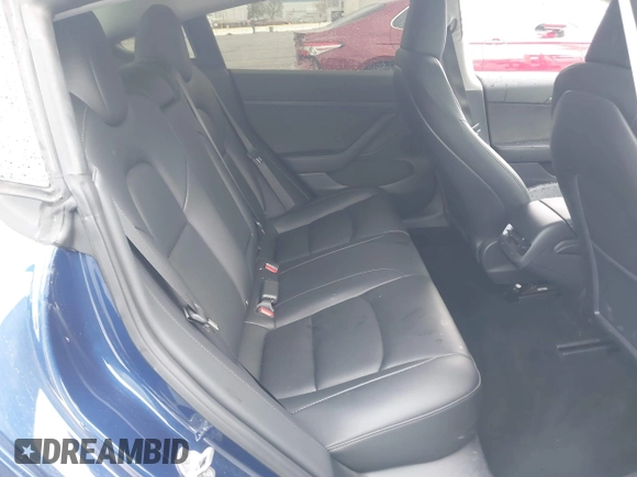 2023 Tesla Model 3 with VIN 5YJ3E1EA0PF518983, listed as a IAAI auction lot 41749225 with 26,748 mi miles and . Bid and sale history available at DreamBid. Image 8.