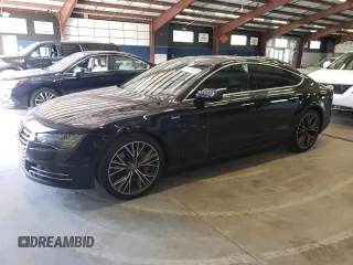 2016 Audi A7 3.0 Premium Plus with VIN WAUWGAFC5GN064672, listed as a Copart auction lot 71574044 with 64,927 mi miles and Salvage Title. Bid and sale history available at carsss.com. Image 1.