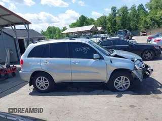 2003 Toyota RAV4 with VIN JTEGH20V030084397, listed as a IAAI auction lot 42157202 with 117,215 mi miles and . Bid and sale history available at DreamBid. Image 13.