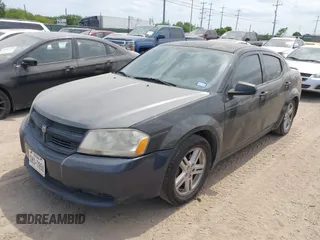2014 Dodge Avenger SE with VIN 1C3CDZAB2EN154553, listed as a IAAI auction lot 42056243 with 246,442 mi miles. Bid and sale history available at carsss.com. Image 2.