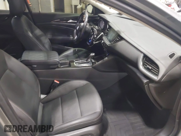 2018 Buick Regal Essence with VIN W04GV8SX5J1110895, listed as a IAAI auction lot 41524602 with 93,920 mi miles and . Bid and sale history available at DreamBid. Image 5.