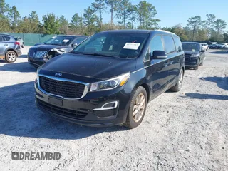2019 Kia Sedona LX with VIN KNDMB5C1XK6537049, listed as a IAAI auction lot 41777727 with 86,987 mi miles. Bid and sale history available at carsss.com. Image 2.