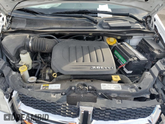2017 Dodge Grand Caravan SXT with VIN 2C4RDGCG6HR761257, listed as a Copart auction lot 43069225 with 88,540 mi miles and Salvage Title. Bid and sale history available at DreamBid. Image 12.