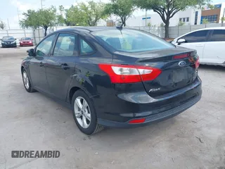 2014 Ford Focus SE with VIN 1FADP3F22EL102502, listed as a IAAI auction lot 41969213 with 154,946 mi miles. Bid and sale history available at carsss.com. Image 3.